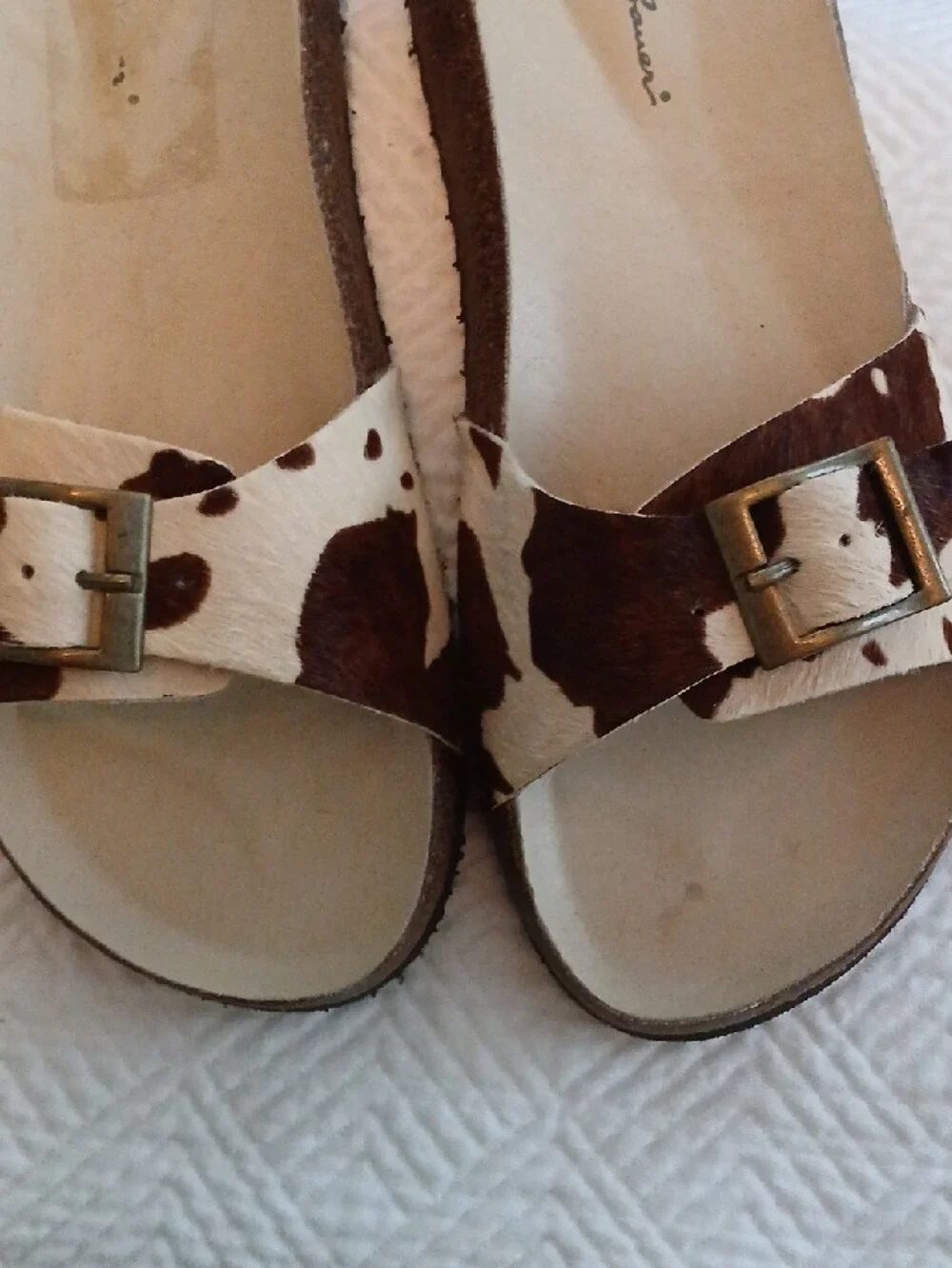 Girls Cow-Print Slide Sandals with Gold Buckle - Brown & White